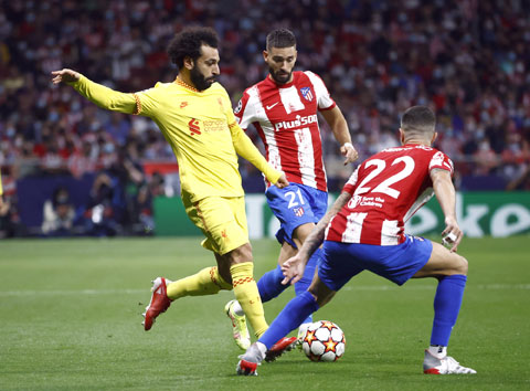 Salah (áo vàng) cùng đồng đội ăn mừng chiến thắng trước Atletico